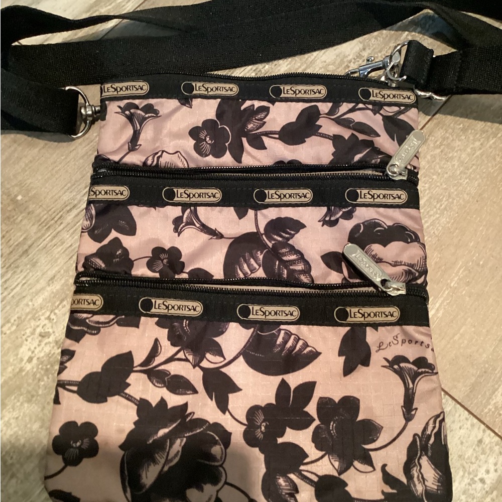 LeSportsac Pink and Black Crossbody Bag with Floral Design